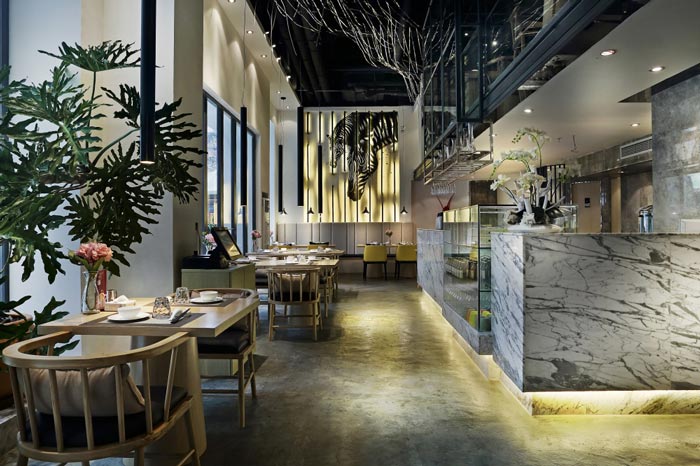 300平方素食文化餐厅前台休息区域设计效果图